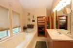 Master bathroom with Jacuzzi and sauna